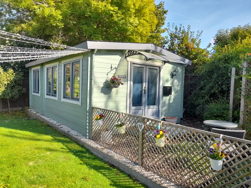 Photo 1: View of the lodge