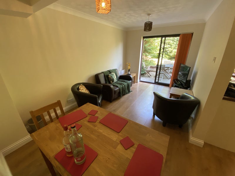 Photo 1: Dining area adjacent to kitchen 