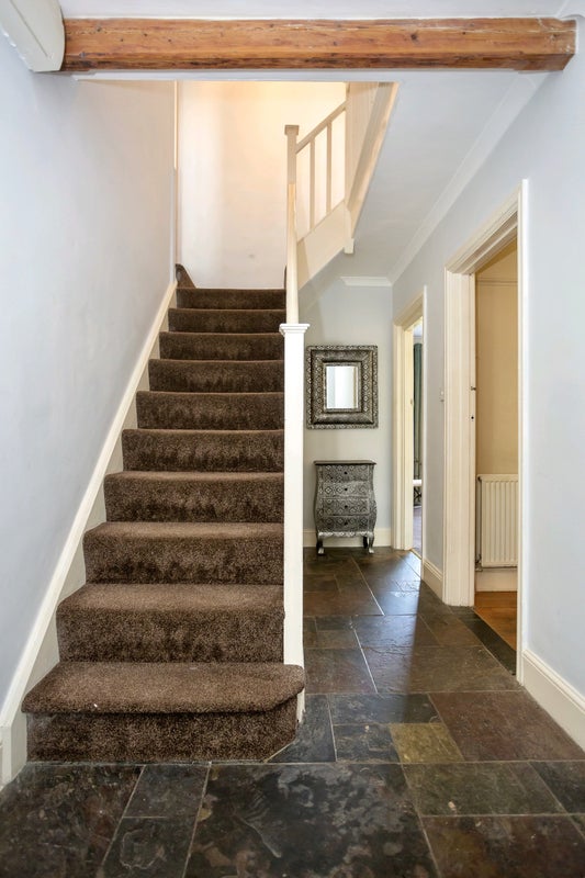 Photo 5: Stairs to tof floor bedrooms