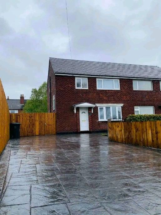 Photo 1: Front of house