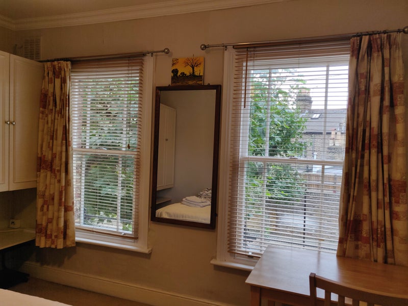 Photo 1: Front bedroom