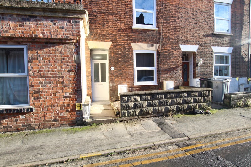 Photo 1: Front Of The Property 