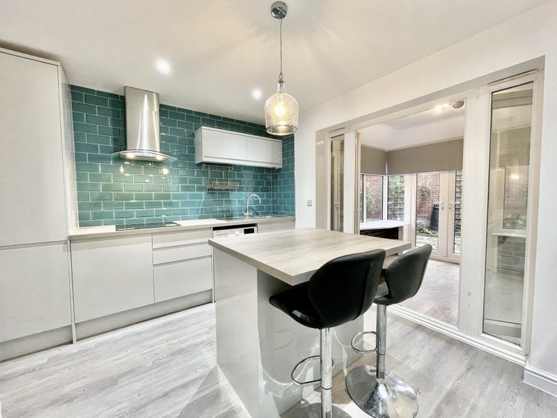 Photo 1: Kitchen