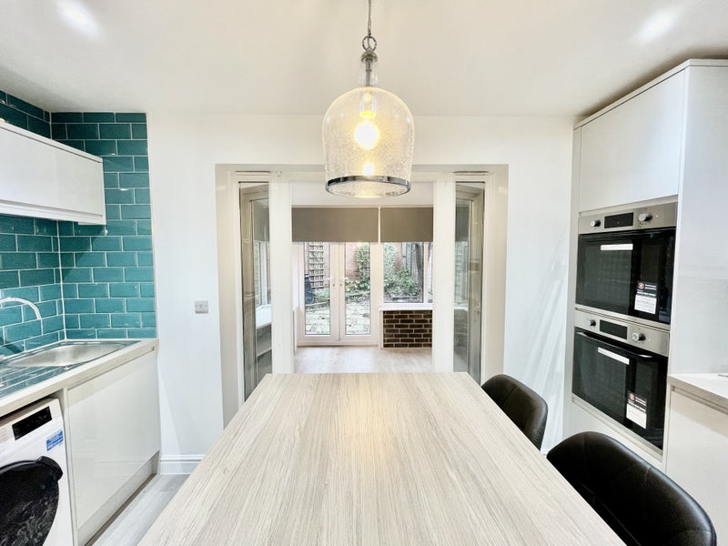 Photo 1: Kitchen