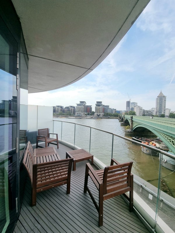 Photo 1: Riverside view from balcony