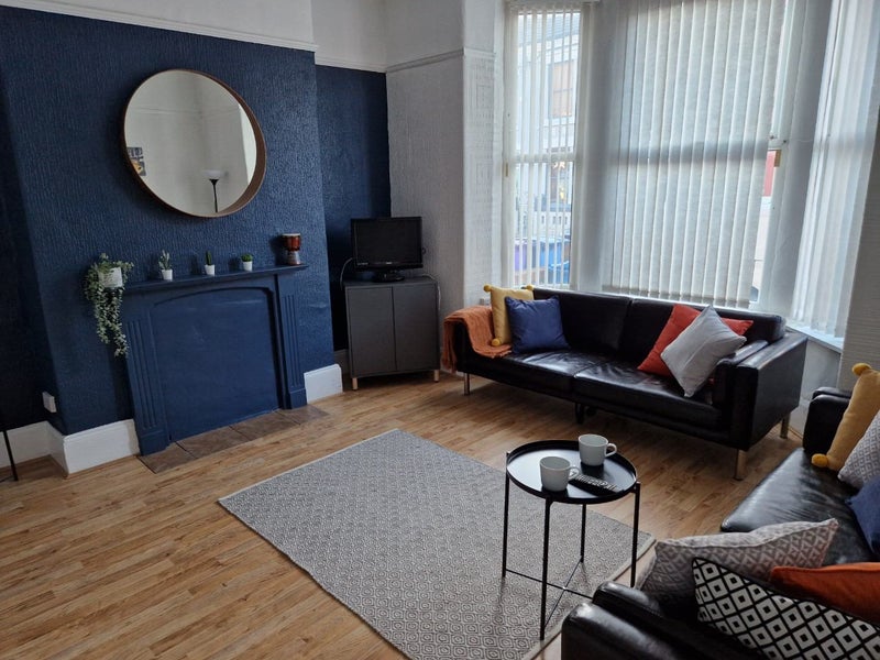 Photo 1: Communal Lounge