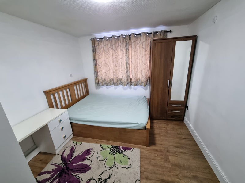 Photo 1: Double bed room with Ottoman bed under storage 