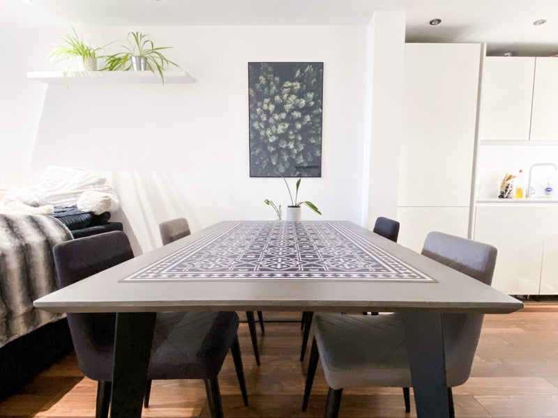 Photo 1: Stylish living space with dining table