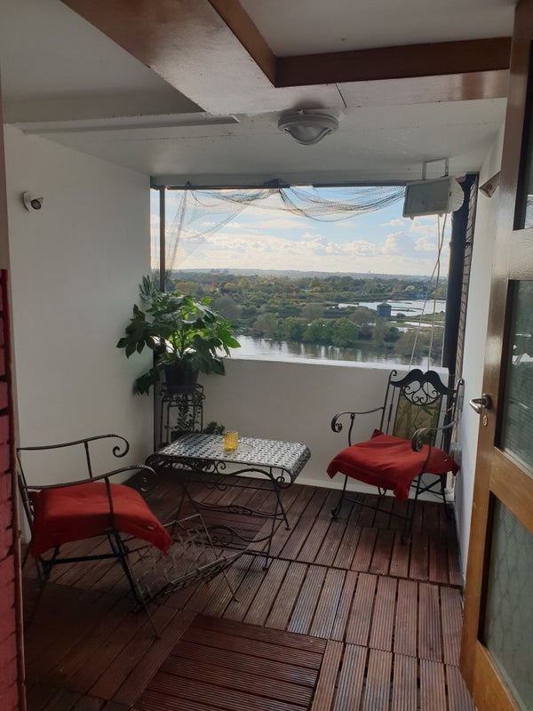 Photo 1: Balcony overlooking rivet