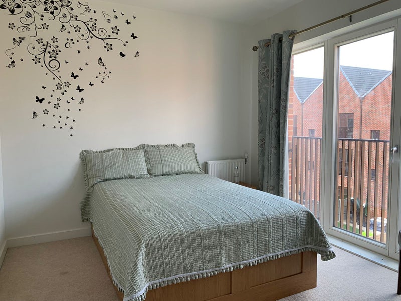 Photo 1: Bedroom with garden view