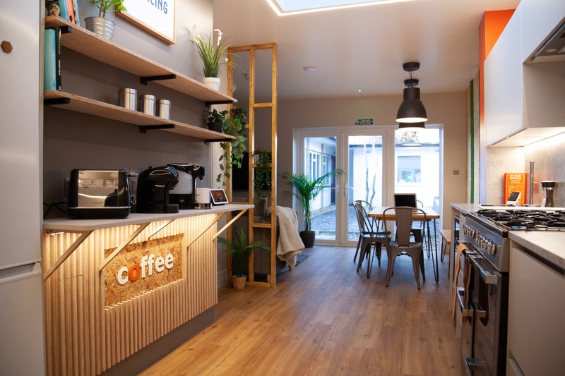Photo 1: Dining area overlooking the garden