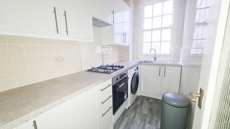 Photo 1: Kitchen