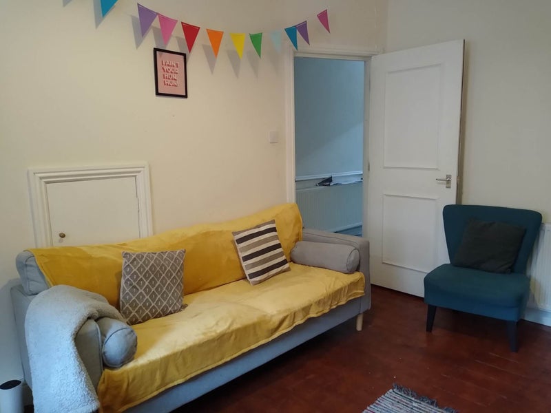 Photo 1: Shared Living room space