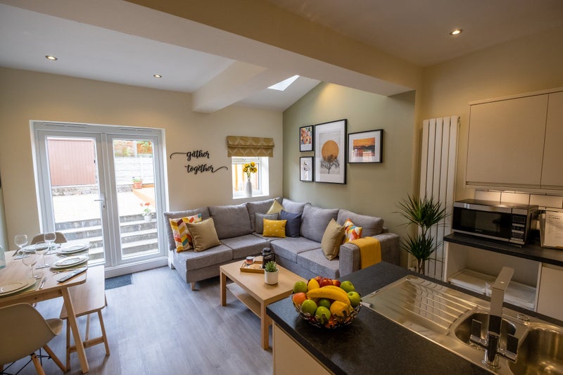 Photo 1: Bright and sunny living/dining space onto West facing garden.