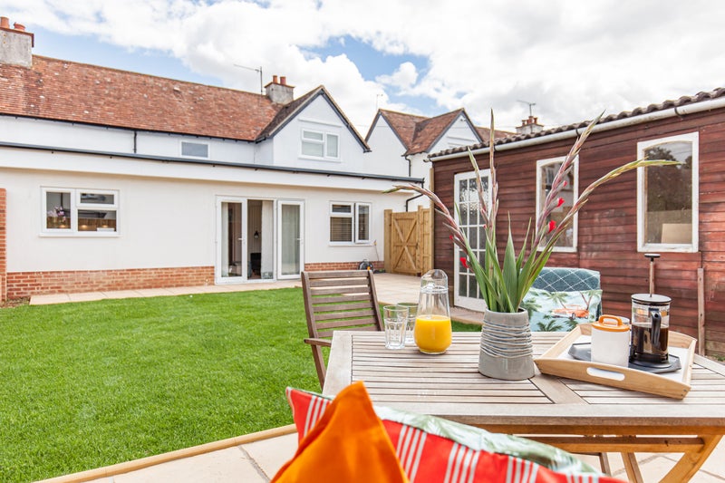 Photo 1: Garden with BBQ and Bike shed