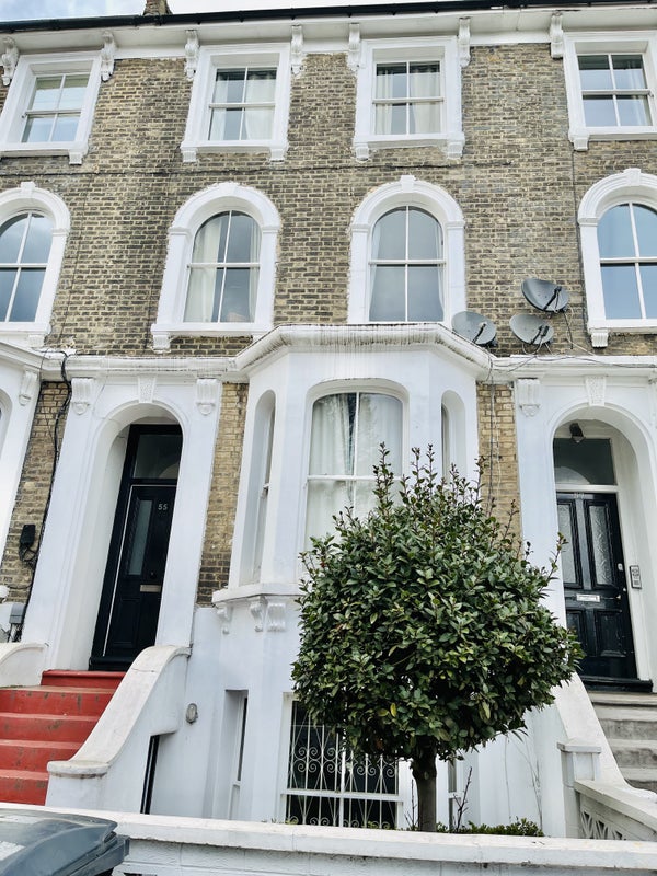 Photo 1: Front of house