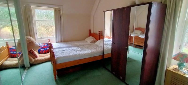 Photo 1: Left hand mirror is almost a full wall-length cupboard 