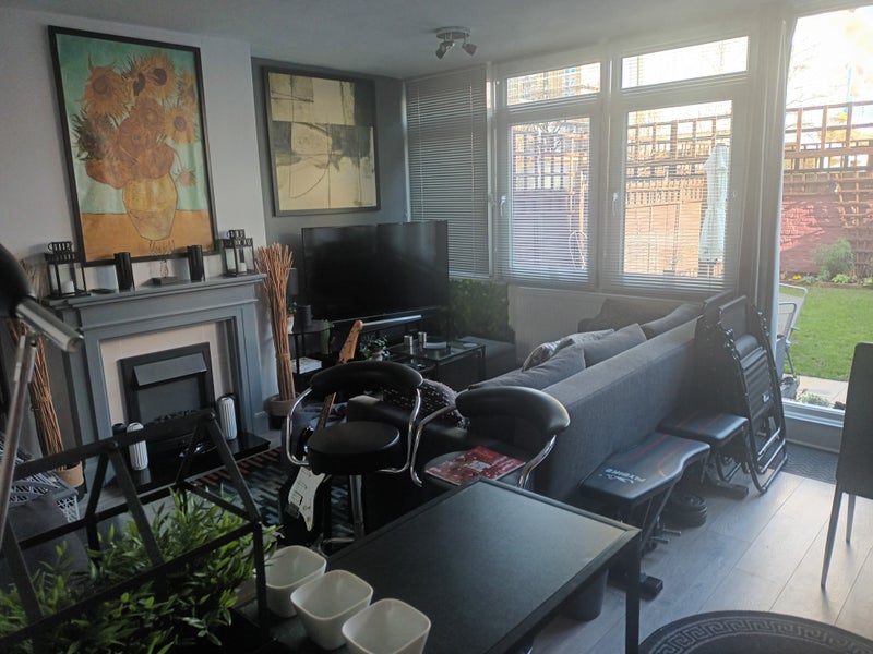 Photo 1: Shared living area 