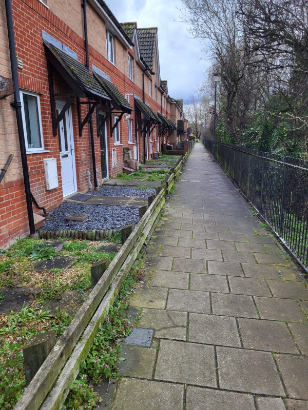 Photo 1: Front of house