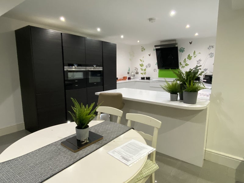 Photo 1: Kitchen