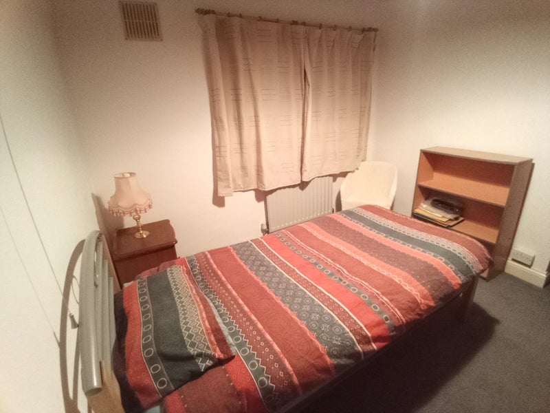 Photo 1: Single bed, bookcase, chair and bedside table 