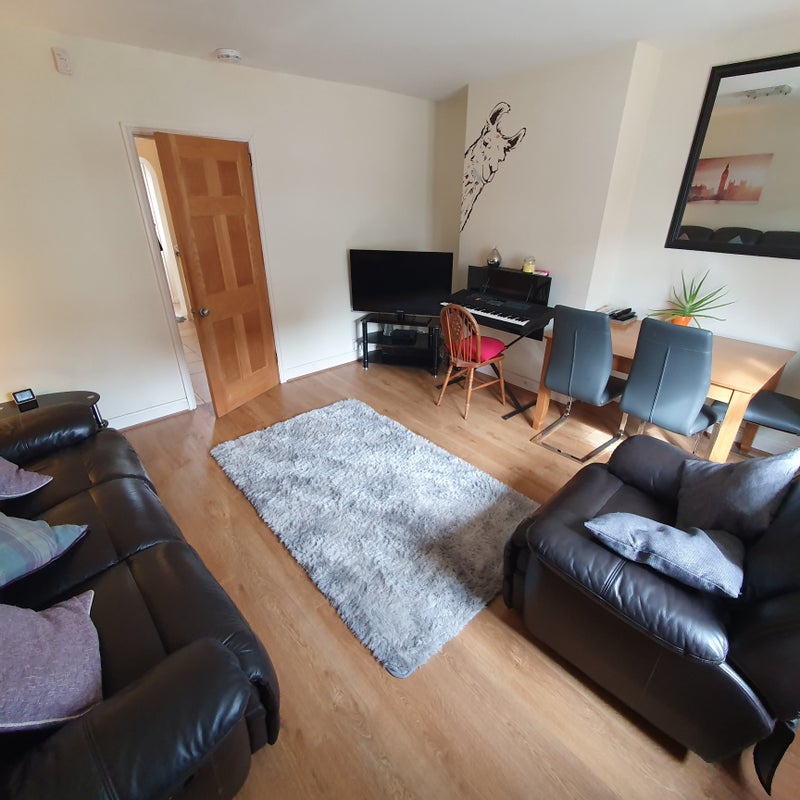 Photo 1: Shared Living Room