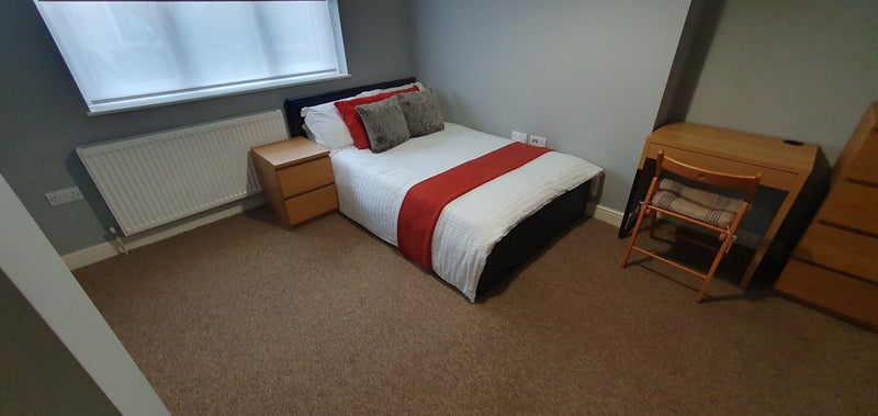 Photo 1: Ottoman Storage Bed