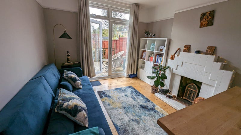 Photo 1: Cosy lounge with decking outside. Can work from home here