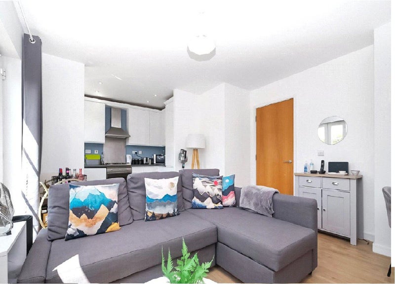 Photo 1: Living/Dining Room