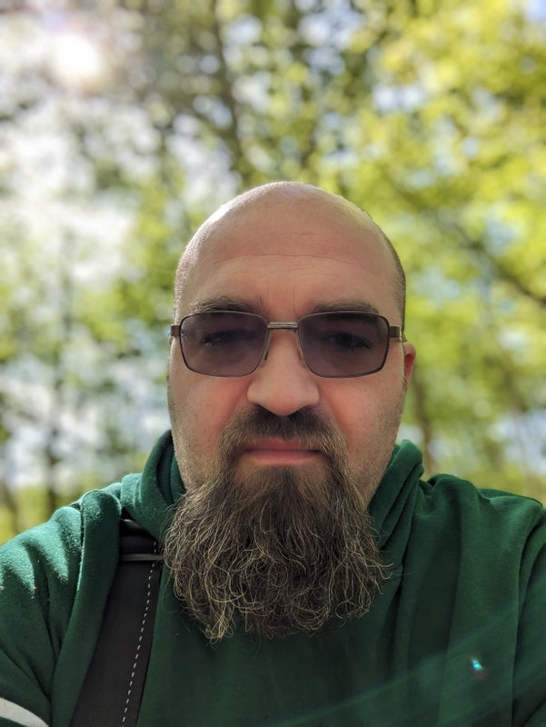 Photo 1: Me. Beard is gone now but growing another.