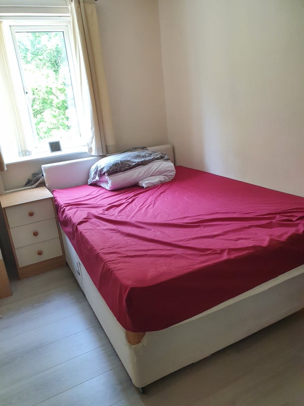 Photo 1: double bed room  with book case