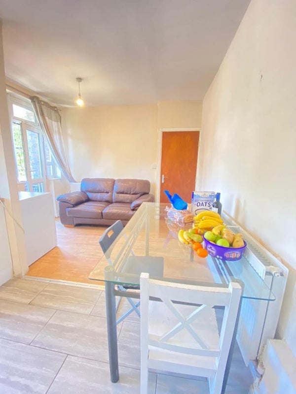 Photo 1: Modern kitchen and dining area