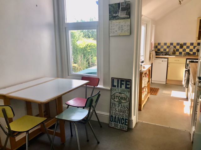 Photo 1: shared breakfast room and kitchen