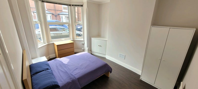 Photo 1: Bay window fills the room with natural light