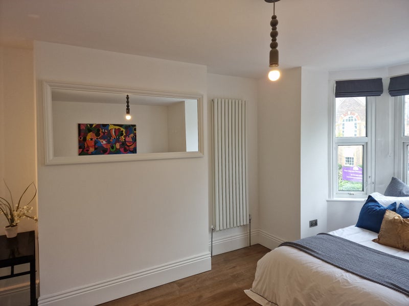 Photo 1: Spacious Room