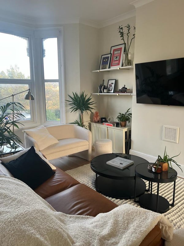 Photo 1: Living room with bay window