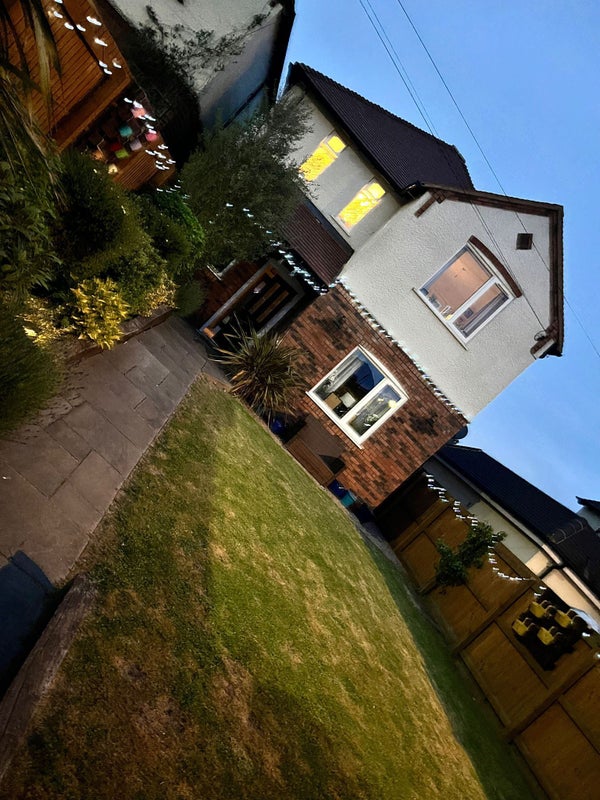 Photo 1: Front of the house