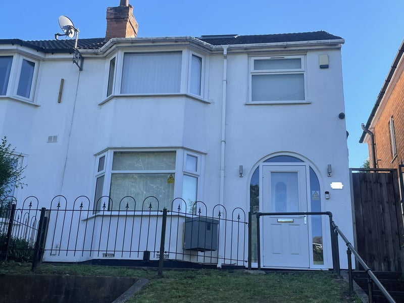 Photo 1: Front of Property