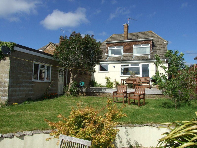 Photo 1: beautiful sunny private and quiet garden with Lawn, decking and beach-like area.