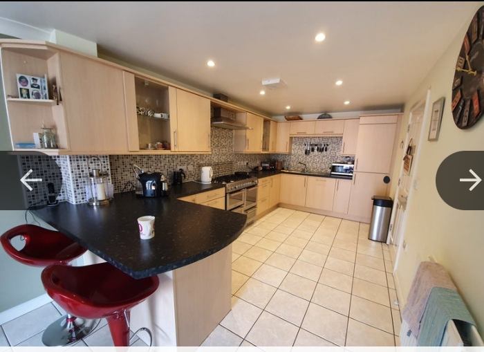 Photo 1: Kitchen area