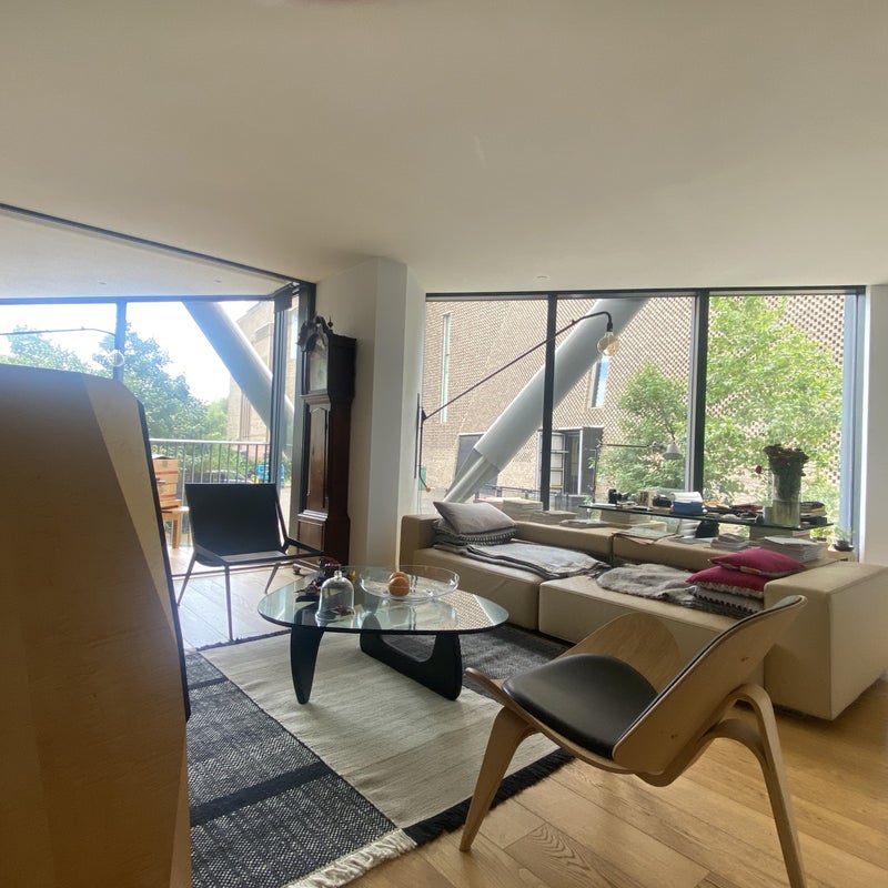 Photo 1: View from entrance to living room out to Tate 
