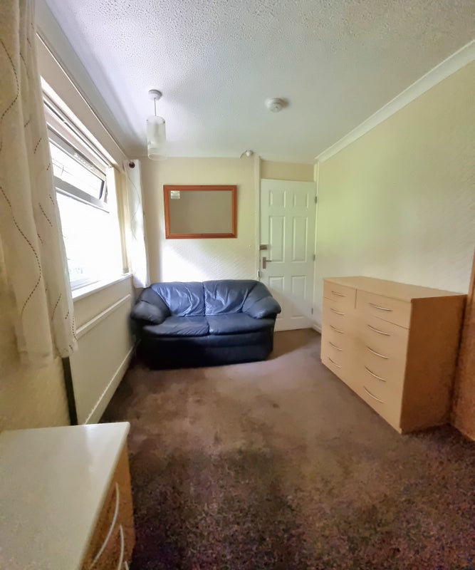 Photo 1: Another view of the bedroom. Fire rated doors, every room has a linked smoke detector