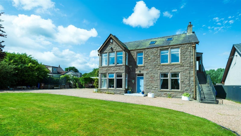 Photo 1: Front of house - access at top of stairs to flat