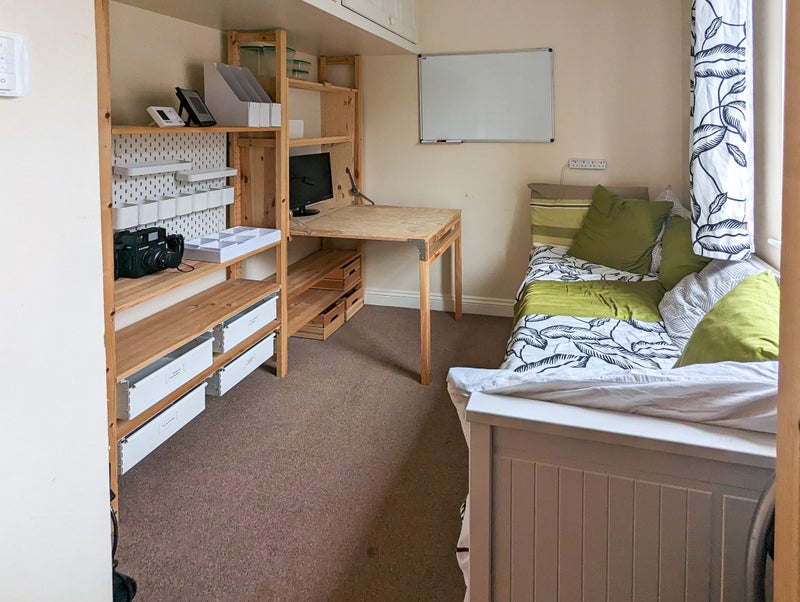 Photo 1: Single bedroom with fold out desk