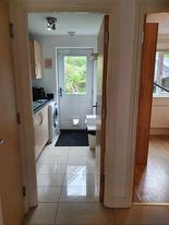 Photo 1: newly decorated and equipped., kitchen left, bedroom right overlooking garden