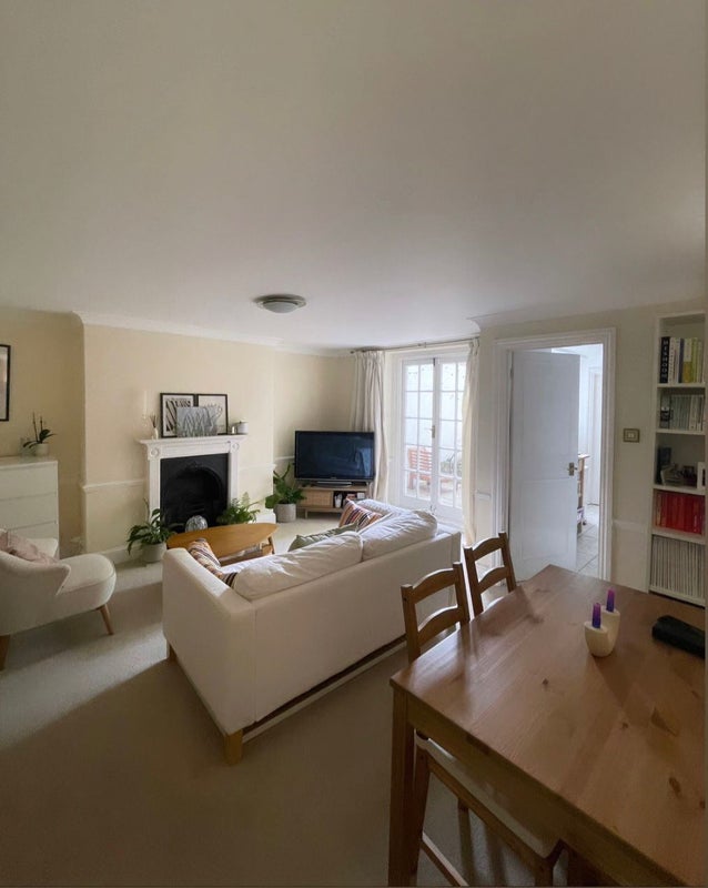 Photo 1: Living/dining room