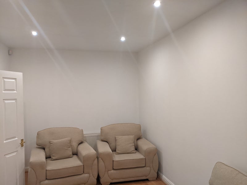 Photo 1: Shared living space