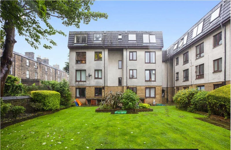 Photo 1: Back garden