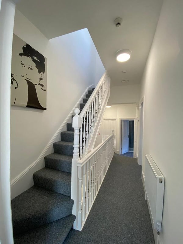 Photo 1: first floor / stairs to 2nd floor