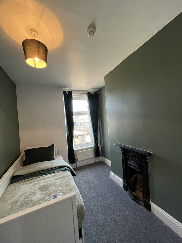 Photo 1: Second bedroom 